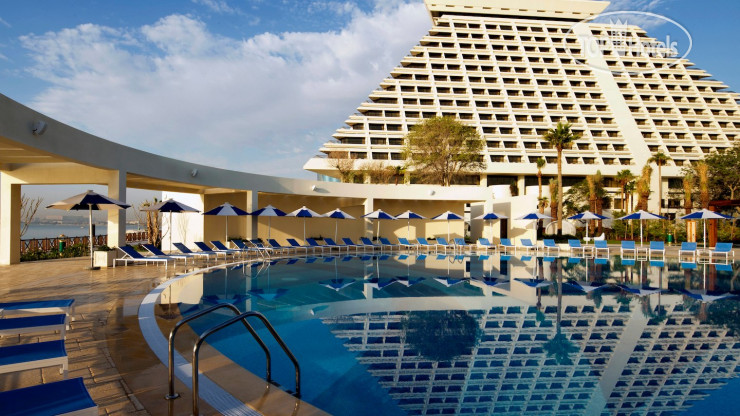 Фото Sheraton Grand Doha Resort & Convention Hotel